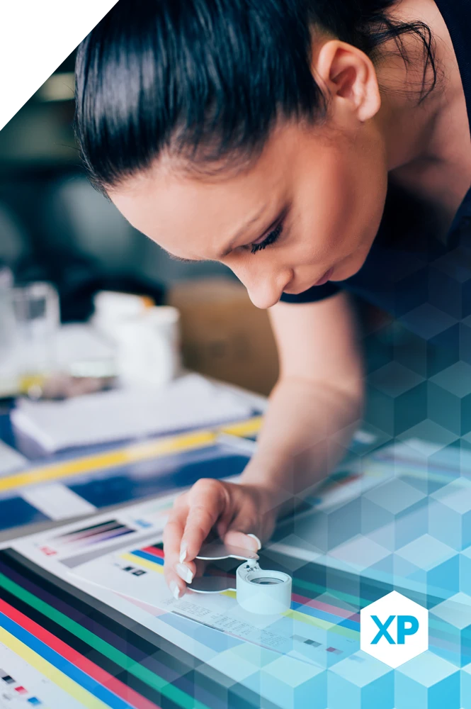 Woman reviewing print test